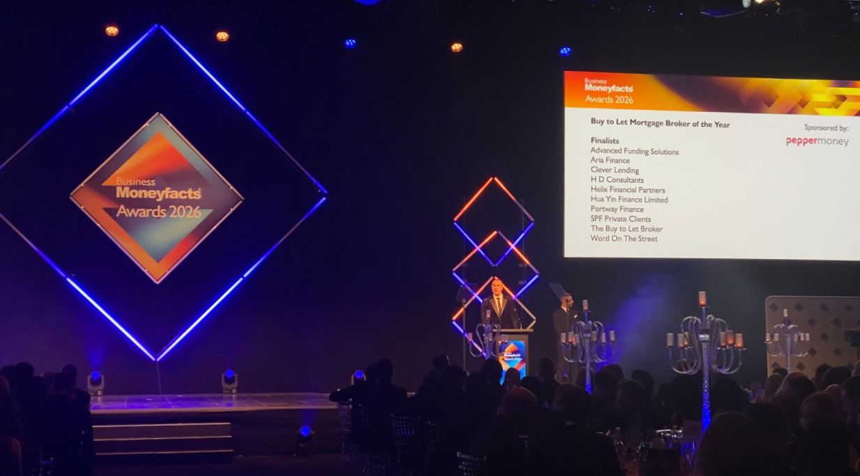 Business Moneyfacts Awards 2026 stage showing Hua Yin Finance as finalist